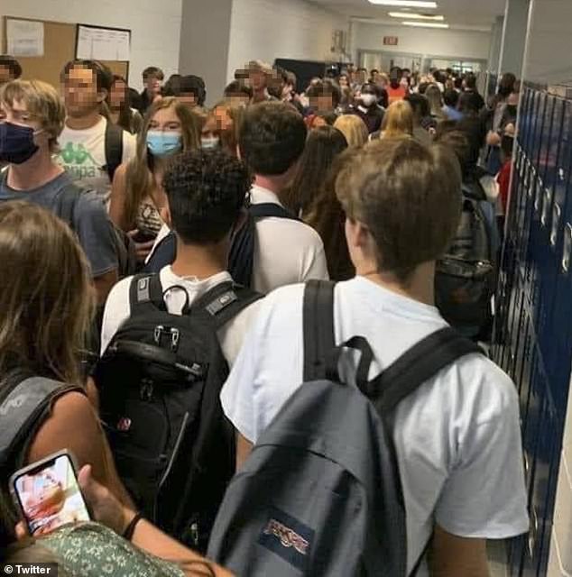 Two students who posted images on social media showing crowded hallways at North Paulding High School in Paulding County, Georgia (above) say they have been suspended. The image above went viral on Tuesday after it was anonymously posted to Twitter